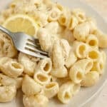 Pasta in a serving dish with a fork.